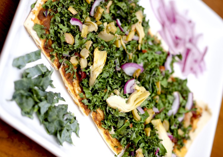 Try thin-crust kale pizza for a healthier alternative