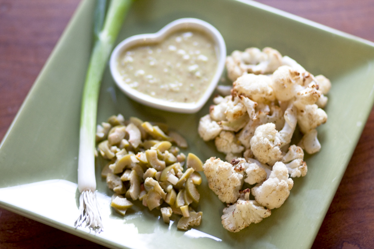 Celebrate cauliflower by serving the versatile vegetable roasted with a vinaigrette